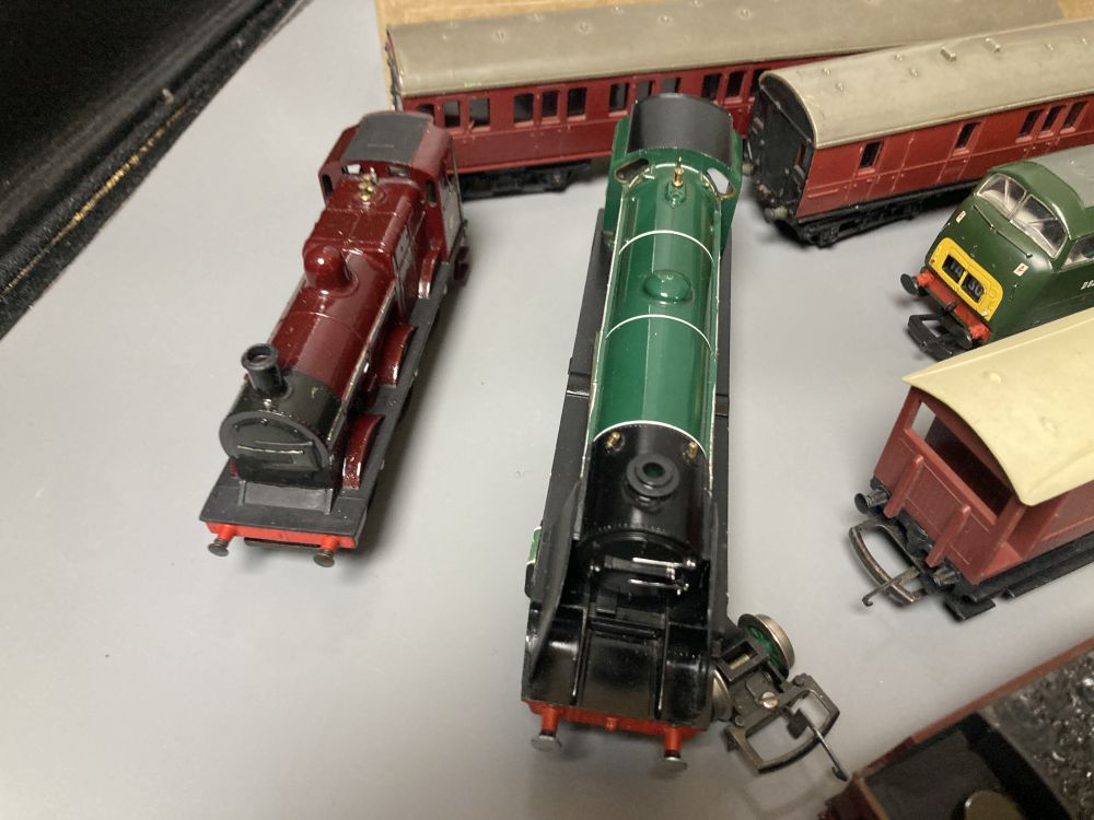 A collection of 00 gauge locomotives, wagons and coaches to include Hornby and Triang